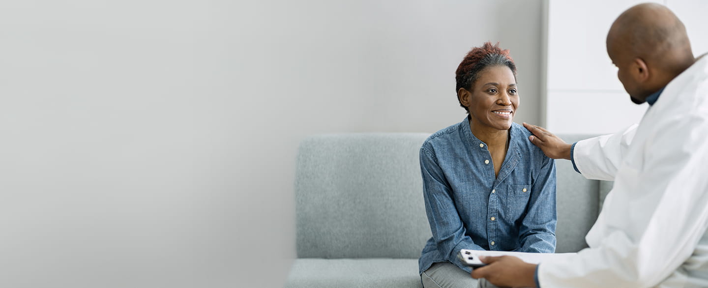 Doctor speaking with a patient