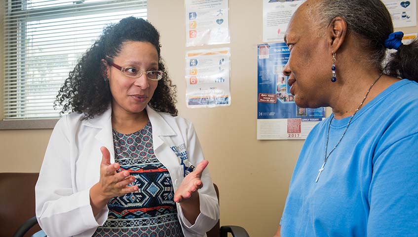 Epilepsy patient Peggy Ann Bell with Dr. Ulloa.
