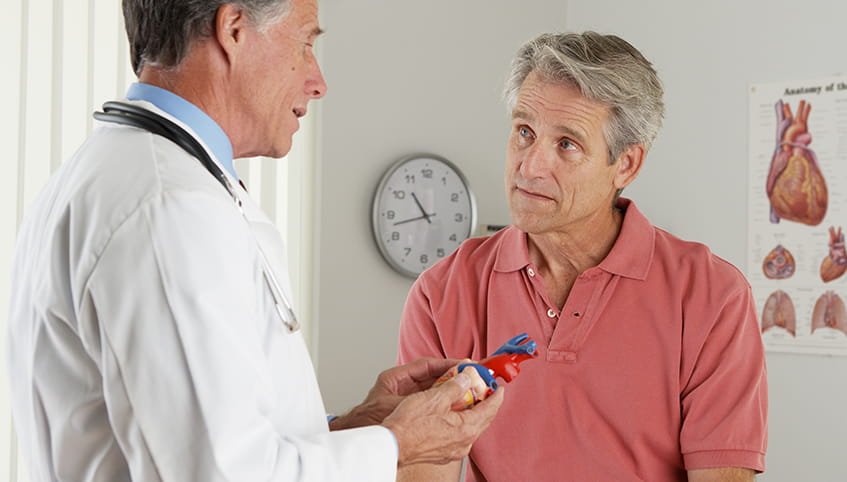 Doctor speaking to a patient