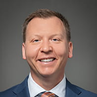 James A Nicholson, MD