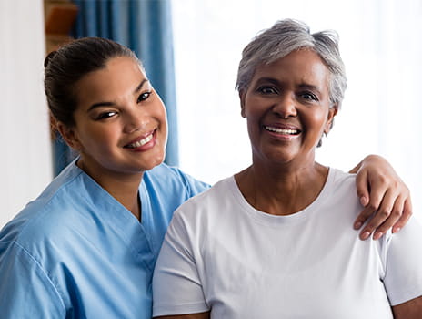 Doctor and patient smiling