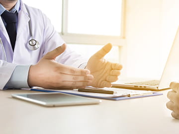 Doctor speaking with a patient