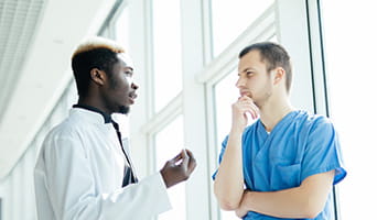 Medical staff consulting with each other