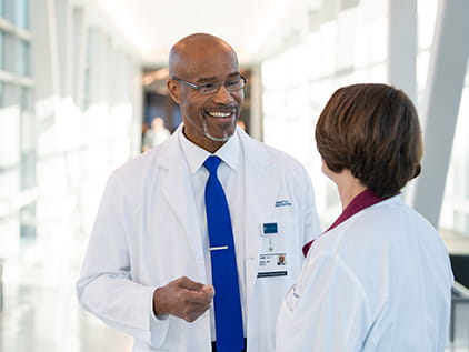 Two doctors talking.